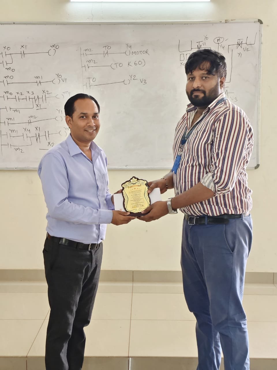 Workshop on application of programmable logic controller and SCADA in product design.